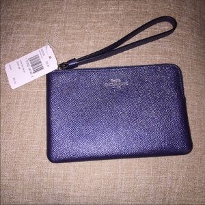 Navy metallic Coach wristlet NWT